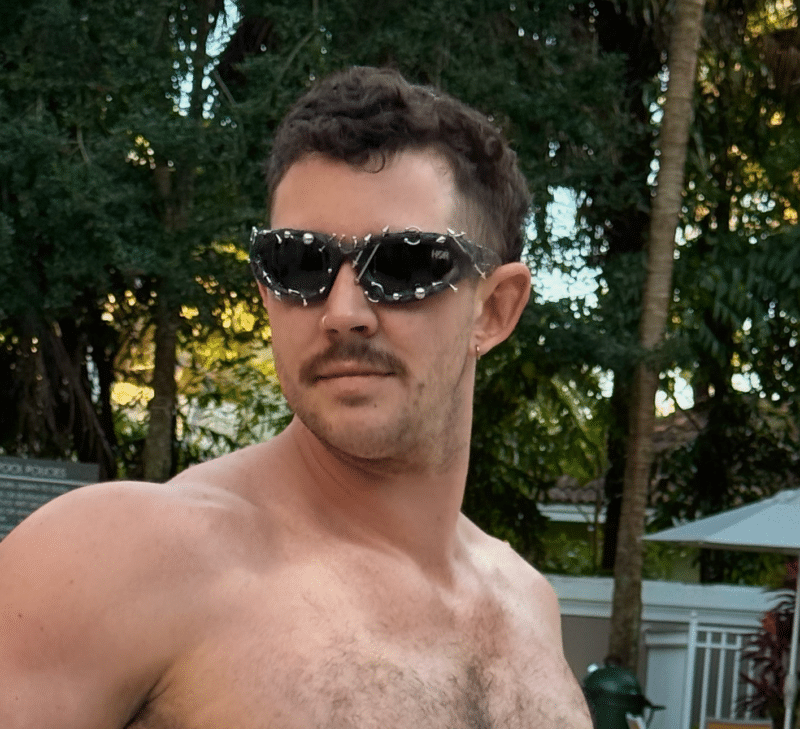 cropped y2k piercing sunglasses black on male model